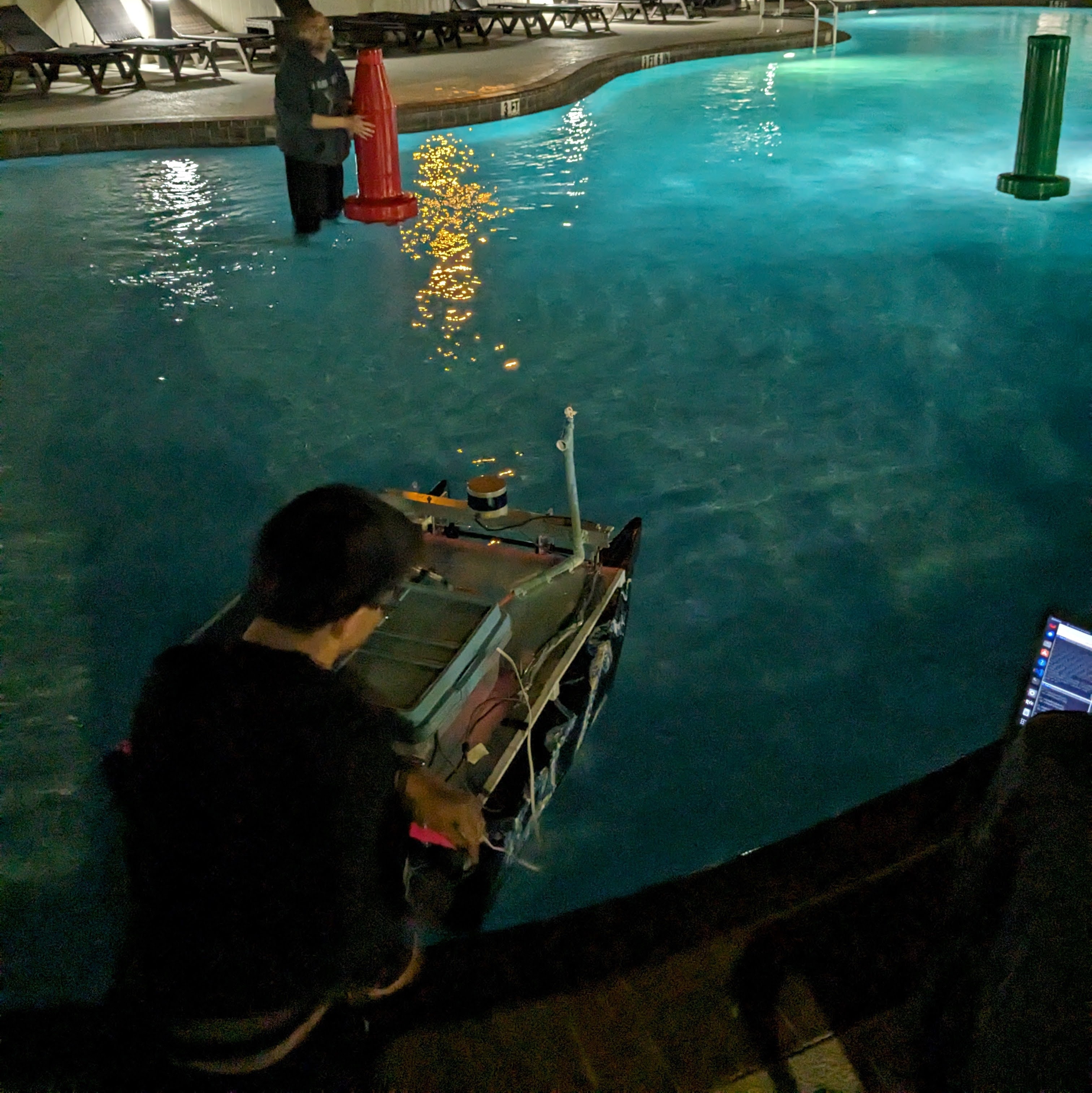 Testing the boat in the hotel pool