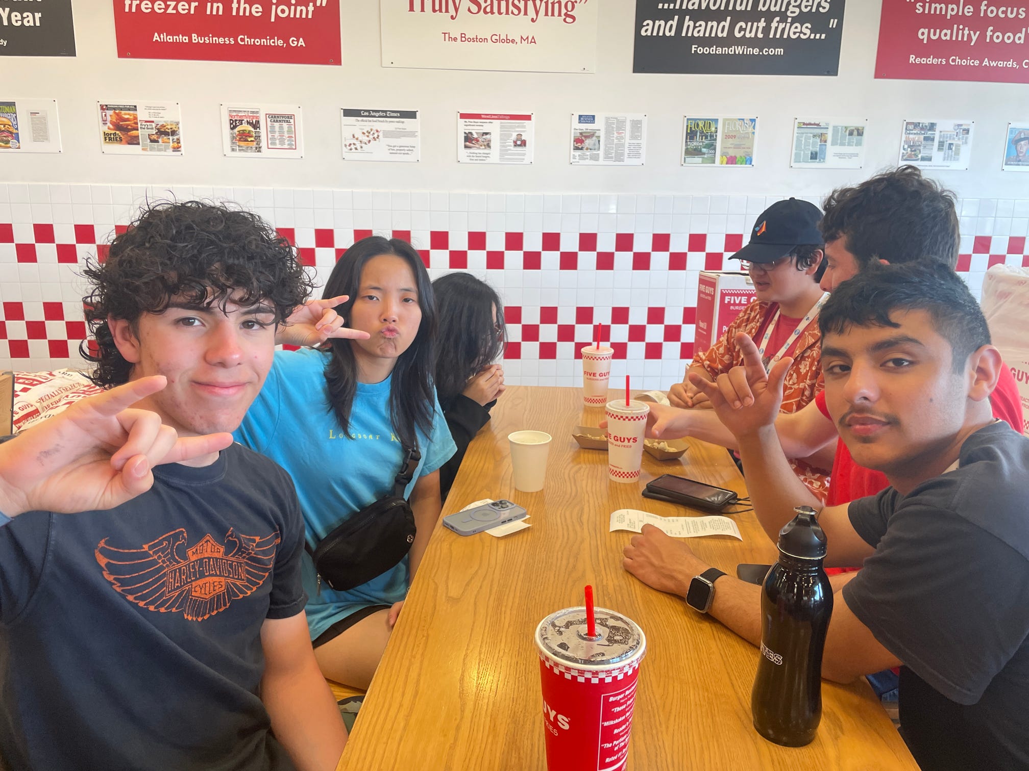 The team eating at Five Guys